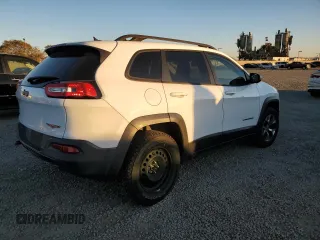 2014 Jeep Cherokee Trailhawk with VIN 1C4PJMBB4EW158878, listed as a Copart auction lot 88818735 with 126,221 mi miles and Clean Title. Bid and sale history available at carsss.com. Image 3.