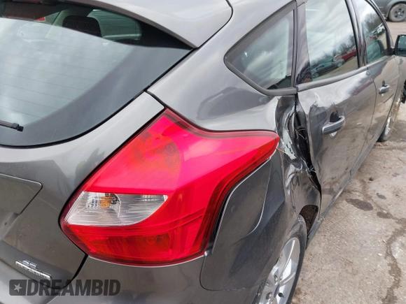 2013 Ford Focus SE with VIN 1FADP3K28DL263859, listed as a IAAI auction lot 41914296 with 103,213 mi miles and . Bid and sale history available at DreamBid. Image 6.