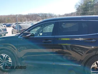 2019 Hyundai Santa Fe Ultimate with VIN 5NMS5CAA6KH075047, listed as a IAAI auction lot 41802407 with 119,063 mi miles and . Bid and sale history available at DreamBid. Image 14.