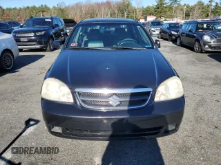 2006 Suzuki Forenza z VIN KL5JD56ZX6K278029, wystawiony jako Copart lot #82026904 z przebiegiem 117 700 mil mil oraz Szkody całkowita. Historia ofert i sprzedaży dostępna na DreamBid. Obrazek 5.