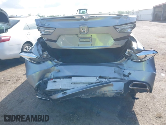2019 Honda Accord Sport with VIN 1HGCV1F34KA089432, listed as a IAAI auction lot 42134526 with 62,398 mi miles and . Bid and sale history available at DreamBid. Image 6.