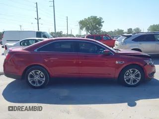 2014 Ford Taurus SEL with VIN 1FAHP2E86EG186642, listed as a IAAI auction lot 41901768 with 106,057 mi miles. Bid and sale history available at carsss.com. Image 13.