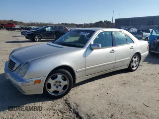 2000 Mercedes-Benz E-Class AWD with VIN WDBJF83J6YX032328, listed as a Copart auction lot 81353974 with 156,729 mi miles and Clean Title. Bid and sale history available at carsss.com. Image 1.