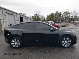 2022 Tesla Model Y Performance with VIN 7SAYGDEF7NF403701, listed as a IAAI auction lot 41961532 with 83,728 mi miles and . Bid and sale history available at DreamBid. Image 14.