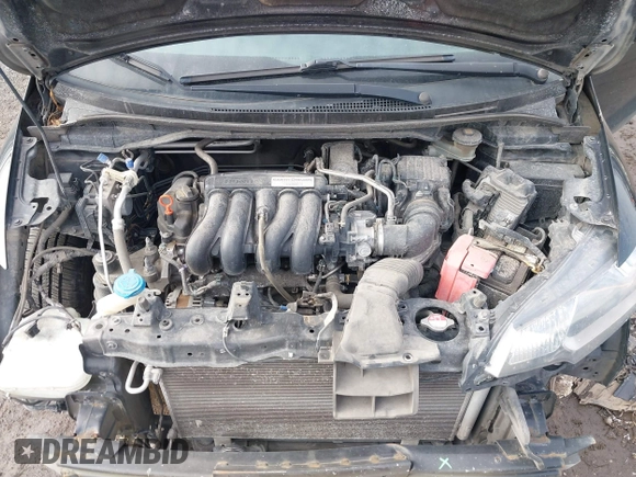 2015 Honda Fit LX with VIN 3HGGK5H50FM768011, listed as a IAAI auction lot 41499374 with 142,211 mi miles and . Bid and sale history available at DreamBid. Image 10.