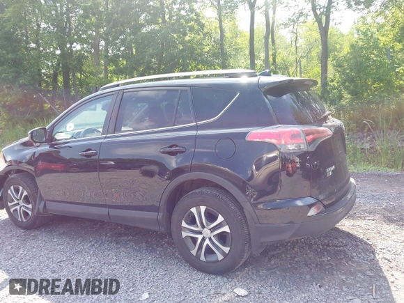 2017 Toyota RAV4 LE with VIN 2T3BFREV5HW651308, listed as a IAAI auction lot 42701783 with 112,829 mi miles and . Bid and sale history available at DreamBid. Image 14.