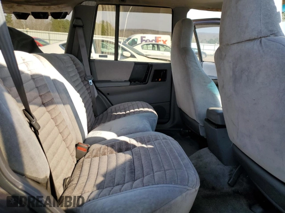 1993 Jeep Grand Cherokee Laredo with VIN 1J4GZ58S8PC656490, listed as a Copart auction lot 49377485 with 236,215 mi miles and Salvage Title. Bid and sale history available at carsss.com. Image 11.