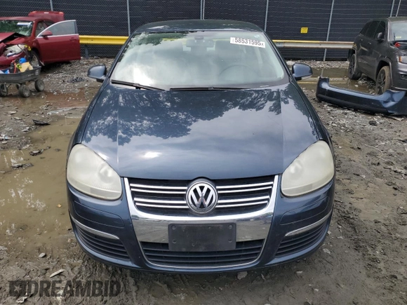 2005 Volkswagen Jetta 2.5L with VIN 3VWRG71K45M628981, listed as a Copart auction lot 58531595 with 128,217 mi miles and Salvage title. Bid and sale history available at DreamBid. Image 5.