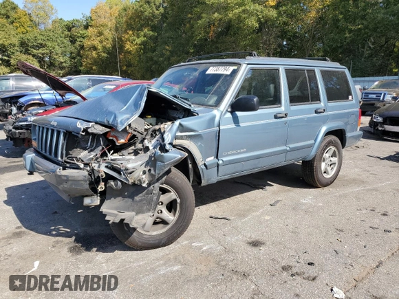 1998 Jeep Cherokee Sport with VIN 1J4FT68S4WL121559, listed as a Copart auction lot 77387794 with 163,453 mi miles and Salvage Title. Bid and sale history available at carsss.com. Image 1.