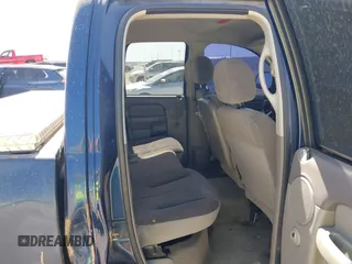 2004 Dodge 1500 SLT with VIN 1D7HA18N04J144868, listed as a IAAI auction lot 41870559 with 157,379 mi miles. Bid and sale history available at carsss.com. Image 8.