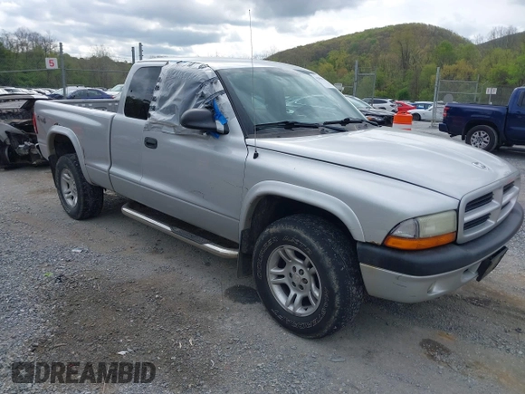 2003 Dodge Dakota Sport with VIN 1D7HG32N13S132871, listed as a IAAI auction lot 42059965 with 125,408 mi miles and . Bid and sale history available at carsss.com. Image 1.
