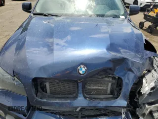 2011 BMW X6 50i with VIN 5UXFG8C51BLZ95772, listed as a Copart auction lot 65733764 with 94,467 mi miles and Salvage Title. Bid and sale history available at carsss.com. Image 12.