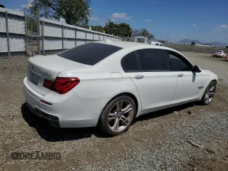 2014 BMW 7 Series 740Li with VIN WBAYE4C57ED137727, listed as a Copart auction lot 51847244 with 136,495 mi miles and Salvage Title. Bid and sale history available at carsss.com. Image 3.
