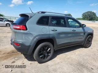 2015 Jeep Cherokee Trailhawk with VIN 1C4PJMBS4FW687328, listed as a Copart auction lot 58927765 with 119,483 mi miles and Non repairable. Bid and sale history available at DreamBid. Image 3.