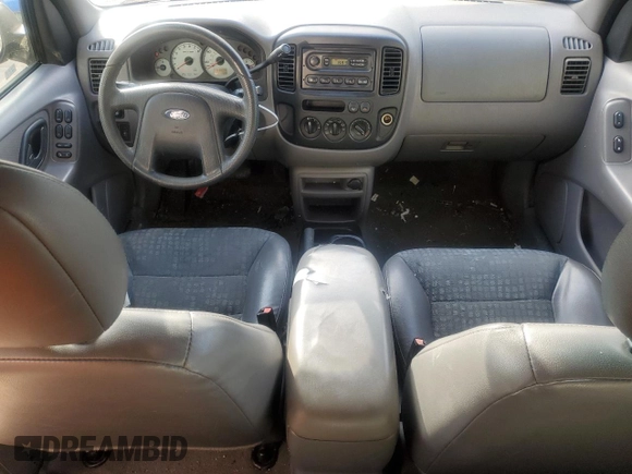 2002 Ford Escape XLS Choice z VIN 1FMYU01102KC91021, wystawiony jako Copart lot #47584065 z przebiegiem 211 589 mil mil oraz Czysty tytuł • Clean title. Historia ofert i sprzedaży dostępna na DreamBid. Obrazek 8.