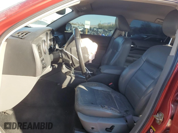 2005 Dodge Magnum RT with VIN 2D8GV582X5H124753, listed as a Copart auction lot 81355944 with 136,951 mi miles and Salvage Title. Bid and sale history available at DreamBid. Image 7.