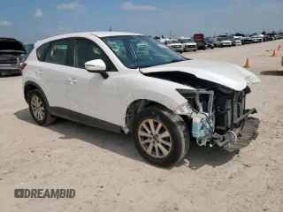 2016 Mazda CX-5 Sport with VIN JM3KE4BY0G0742436, listed as a Copart auction lot 59693945 with 74,314 mi miles and Salvage title. Bid and sale history available at DreamBid. Image 4.