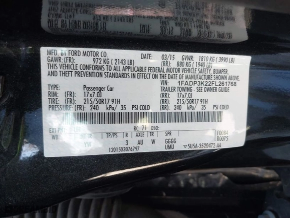 2015 Ford Focus SE with VIN 1FADP3K22FL261768, listed as a IAAI auction lot 41830768 with 121,957 mi miles. Bid and sale history available at carsss.com. Image 9.