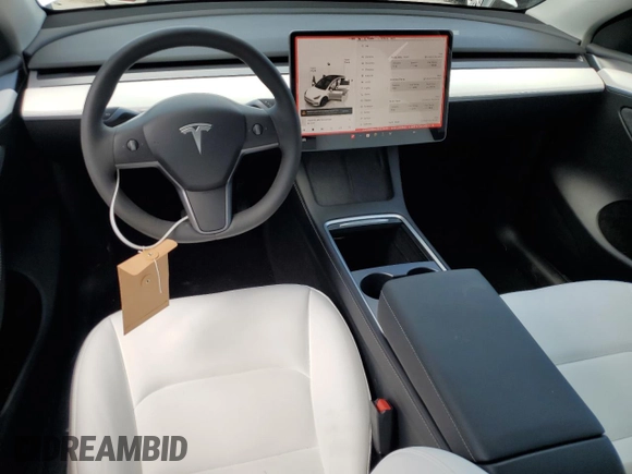 2025 Tesla Model Y Long Range with VIN 7SAYGDED4SF232433, listed as a Copart auction lot 51504015 with Not Provided miles and Salvage Title. Bid and sale history available at DreamBid. Image 8.