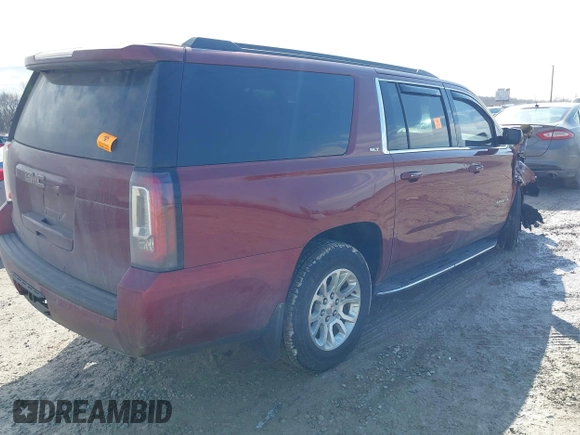 2019 GMC Yukon XL SLT with VIN 1GKS2GKC9KR341807, listed as a IAAI auction lot 41658848 with 68,204 mi miles. Bid and sale history available at carsss.com. Image 4.