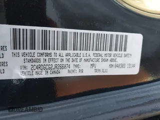 2018 Dodge Grand Caravan SXT with VIN 2C4RDGCG2JR266074, listed as a IAAI auction lot 40545630 with 98,036 mi miles and . Bid and sale history available at DreamBid. Image 9.