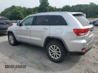 2011 Jeep Grand Cherokee Laredo with VIN 1J4RR4GG3BC581321, listed as a Copart auction lot 60893935 with 216,137 mi miles and Clean title. Bid and sale history available at DreamBid. Image 2.