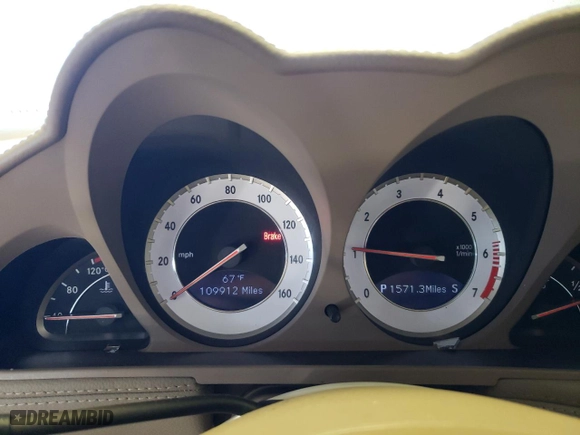 2009 Mercedes-Benz SL-Class V8 with VIN WDBSK71F29F142731, listed as a Copart auction lot 57281054 with 109,912 mi miles and Salvage Title. Bid and sale history available at carsss.com. Image 9.