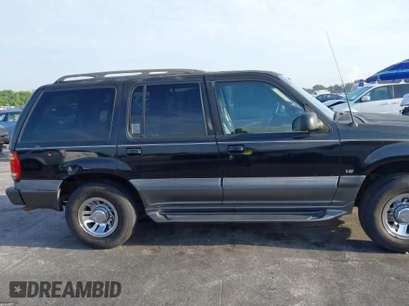 1999 Mercury Mountaineer z VIN 4M2ZU52P9XUJ11372, wystawiony jako IAAI lot #41849011 z przebiegiem 286 379 mil mil oraz . Historia ofert i sprzedaży dostępna na DreamBid. Obrazek 13.