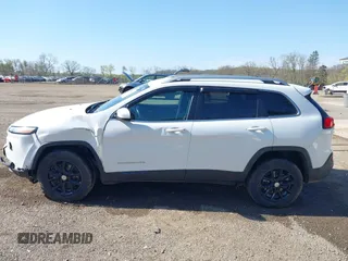 2015 Jeep Cherokee Latitude with VIN 1C4PJMCS0FW790017, listed as a IAAI auction lot 42097988 with 105,990 mi miles and . Bid and sale history available at DreamBid. Image 14.