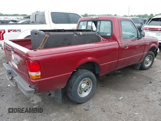 1997 Ford Ranger XLT z VIN 1FTCR10A9VUB45863, wystawiony jako IAAI lot #42133970 z przebiegiem 241 301 mil mil oraz . Historia ofert i sprzedaży dostępna na DreamBid. Obrazek 4.