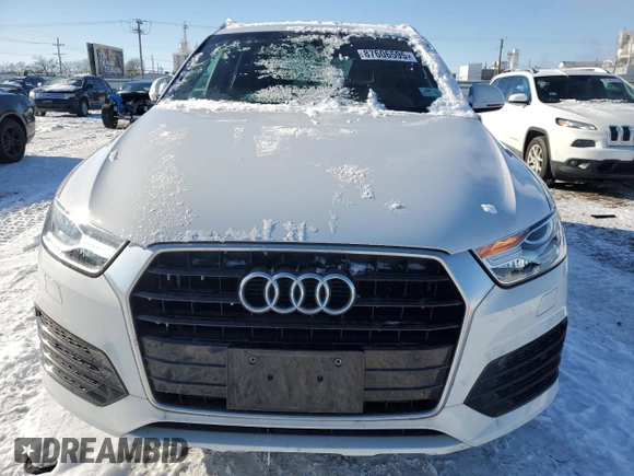 2018 Audi Q3 Premium with VIN WA1BCCFS0JR014031, listed as a Copart auction lot 87606595 with 52,690 mi miles and Salvage title. Bid and sale history available at DreamBid. Image 5.