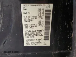 2010 Nissan Titan LE with VIN 1N6BA0EC1AN320311, listed as a Copart auction lot 85157484 with 234,050 mi miles and Salvage Title. Bid and sale history available at carsss.com. Image 12.