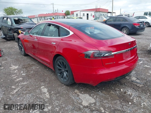 2018 Tesla Model S 75D with VIN 5YJSA1E21JF275546, listed as a IAAI auction lot 42061595 with Not Provided miles and . Bid and sale history available at DreamBid. Image 3.