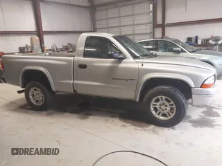2001 Dodge Dakota with VIN 1B7GG26X21S118759, listed as a IAAI auction lot 41943297 with 156,372 mi miles and . Bid and sale history available at carsss.com. Image 13.