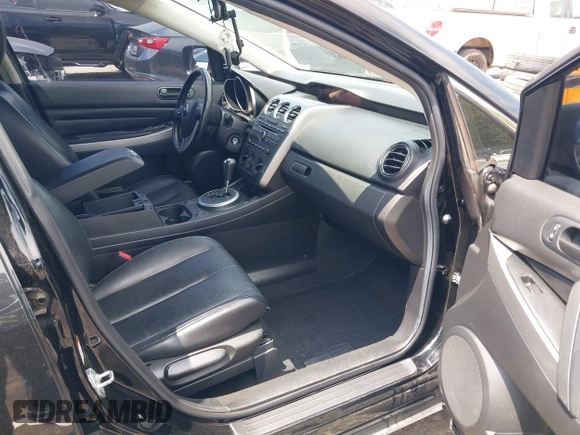 2010 Mazda CX-7 Touring z VIN JM3ER2W30A0341657, wystawiony jako IAAI lot #42123453 z przebiegiem 173 135 mil mil oraz . Historia ofert i sprzedaży dostępna na DreamBid. Obrazek 5.
