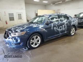 2016 Ford Taurus SEL z VIN 1FAHP2E80GG100695, wystawiony jako Copart lot #54149555 z przebiegiem 145 879 mil mil oraz Czysty tytuł • Clean title. Historia ofert i sprzedaży dostępna na DreamBid. Obrazek 1.