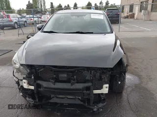 2014 Mazda 3 i Touring with VIN JM1BM1L73E1172987, listed as a IAAI auction lot 42111043 with 121,168 mi miles and . Bid and sale history available at DreamBid. Image 13.