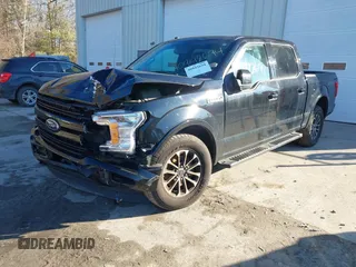 2018 Ford F-150 XL with VIN 1FTEW1EP7JFB77823, listed as a IAAI auction lot 40942694 with 163,078 mi miles. Bid and sale history available at carsss.com. Image 2.