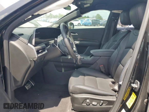 2024 Cadillac XT4 FWD Sport with VIN 1GYFZER41RF136970, listed as a Copart auction lot 53550865 with 13,143 mi miles and Non repairable. Bid and sale history available at DreamBid. Image 7.