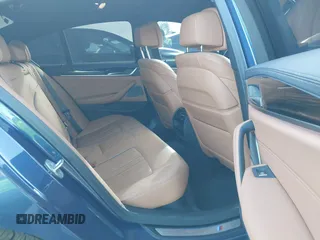 2021 BMW 5 Series M550i xDrive z VIN WBA13BK0XMCG75802, wystawiony jako IAAI lot #41503977 z przebiegiem 20 741 mil mil oraz . Historia ofert i sprzedaży dostępna na DreamBid. Obrazek 8.