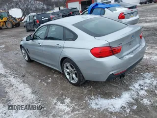 2016 BMW 4 Series 428i xDrive with VIN WBA4C9C53GG136870, listed as a IAAI auction lot 41410071 with 116,187 mi miles and . Bid and sale history available at DreamBid. Image 3.
