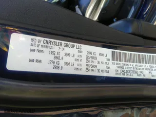 2014 Dodge Durango Limited with VIN 1C4RDJDG3EC585865, listed as a IAAI auction lot 40136282 with 68,046 mi miles. Bid and sale history available at carsss.com. Image 9.