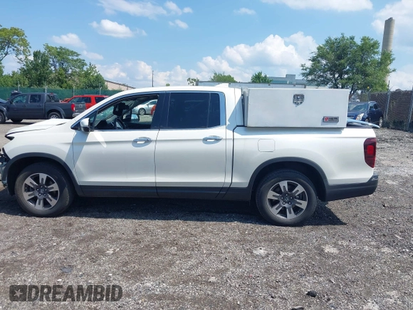 2019 Honda Ridgeline RTL-E with VIN 5FPYK3F71KB017906, listed as a IAAI auction lot 42670476 with 58,288 mi miles and . Bid and sale history available at DreamBid. Image 15.