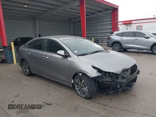 2023 Kia Forte LXS z VIN 3KPF24AD6PE571796, wystawiony jako IAAI lot #41363115 z przebiegiem 30 650 mil mil oraz . Historia ofert i sprzedaży dostępna na DreamBid. Obrazek 1.