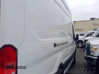 2020 Ford Transit Cargo z VIN 1FTBW3X87LKB80879, wystawiony jako IAAI lot #42546000 z przebiegiem 104 720 mil mil oraz . Historia ofert i sprzedaży dostępna na DreamBid. Obrazek 4.