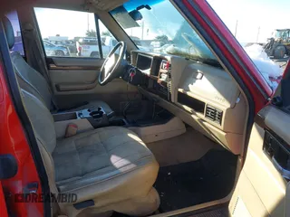 1996 Jeep Cherokee Country with VIN 1J4FJ78S1TL245327, listed as a IAAI auction lot 41443781 with 245,889 mi miles. Bid and sale history available at carsss.com. Image 5.