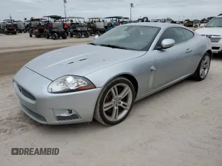 2007 Jaguar XK with VIN SAJWA43C979B19440, listed as a Copart auction lot 76762184 with 0 mi miles and Salvage Title. Bid and sale history available at carsss.com. Image 1.
