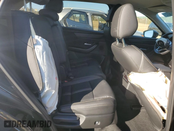 2025 Mazda CX-90 Select z VIN JM3KKAHD3S1190073, wystawiony jako Copart lot #84998104 z przebiegiem 7224 mil mil oraz Szkody całkowita. Historia ofert i sprzedaży dostępna na DreamBid. Obrazek 11.