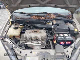 2003 Ford Focus LX z VIN 1FAFP33P83W271153, wystawiony jako IAAI lot #42360855 z przebiegiem 178 711 mil mil oraz . Historia ofert i sprzedaży dostępna na DreamBid. Obrazek 10.