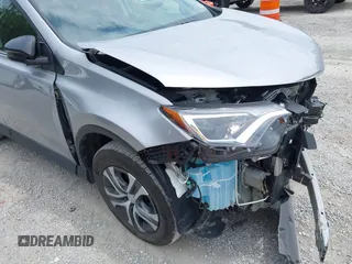 2017 Toyota RAV4 LE with VIN 2T3BFREV1HW686458, listed as a IAAI auction lot 42419676 with 24,579 mi miles and . Bid and sale history available at DreamBid. Image 18.